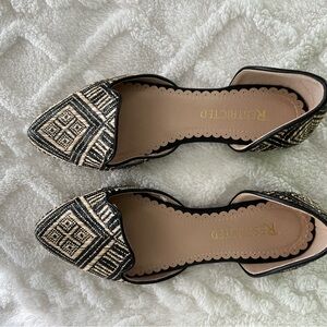Restricted Black and Tan Patterned Flats